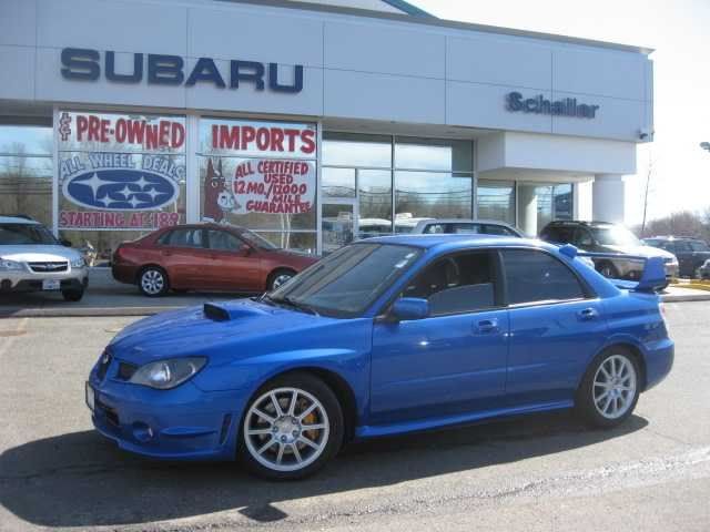 http://i60.photobucket.com/albums/h14/boostedsol94/sti08.jpg