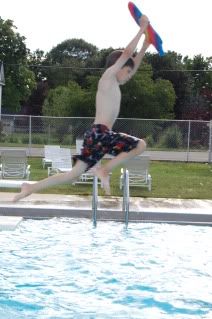 Logan jumping off the board