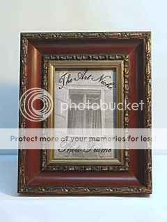 This is a beautiful 5x7 picture frame in the silver/pewter & rosewood 